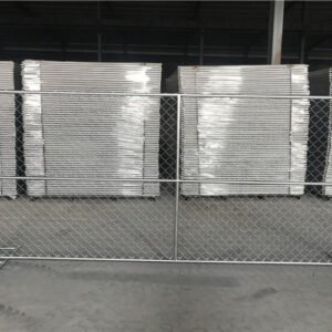 temporary chain link fence panels installed with with two steel stands in our warehouse