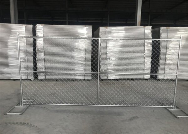 temporary chain link fence panels installed with with two steel stands in our warehouse